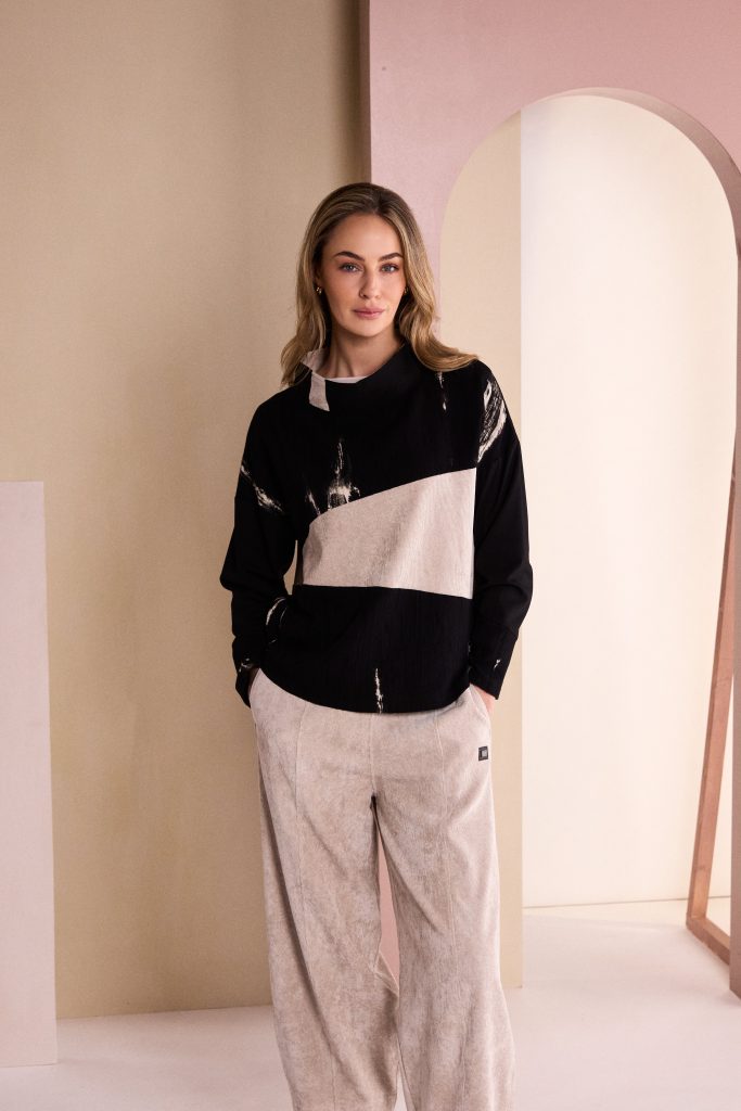 Naya High Neck Top With Corded Angle Section