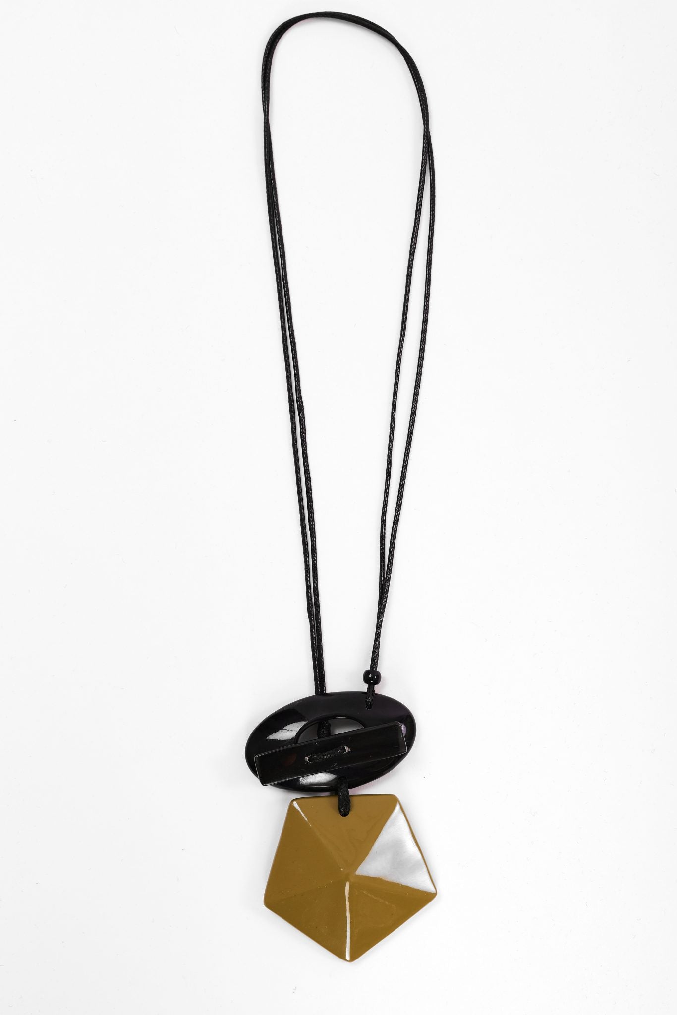 Naya Shaped Stone Necklace With Circle And Bar Trim