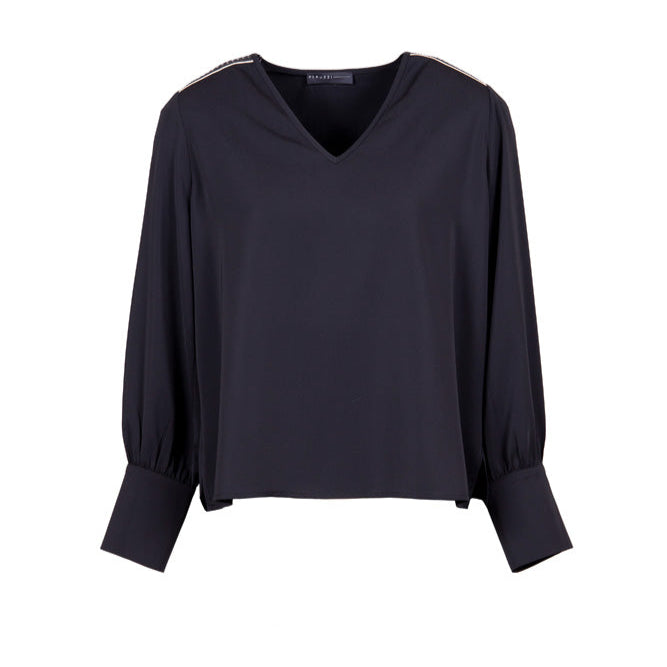 Black blouse with long sleeves on a white background